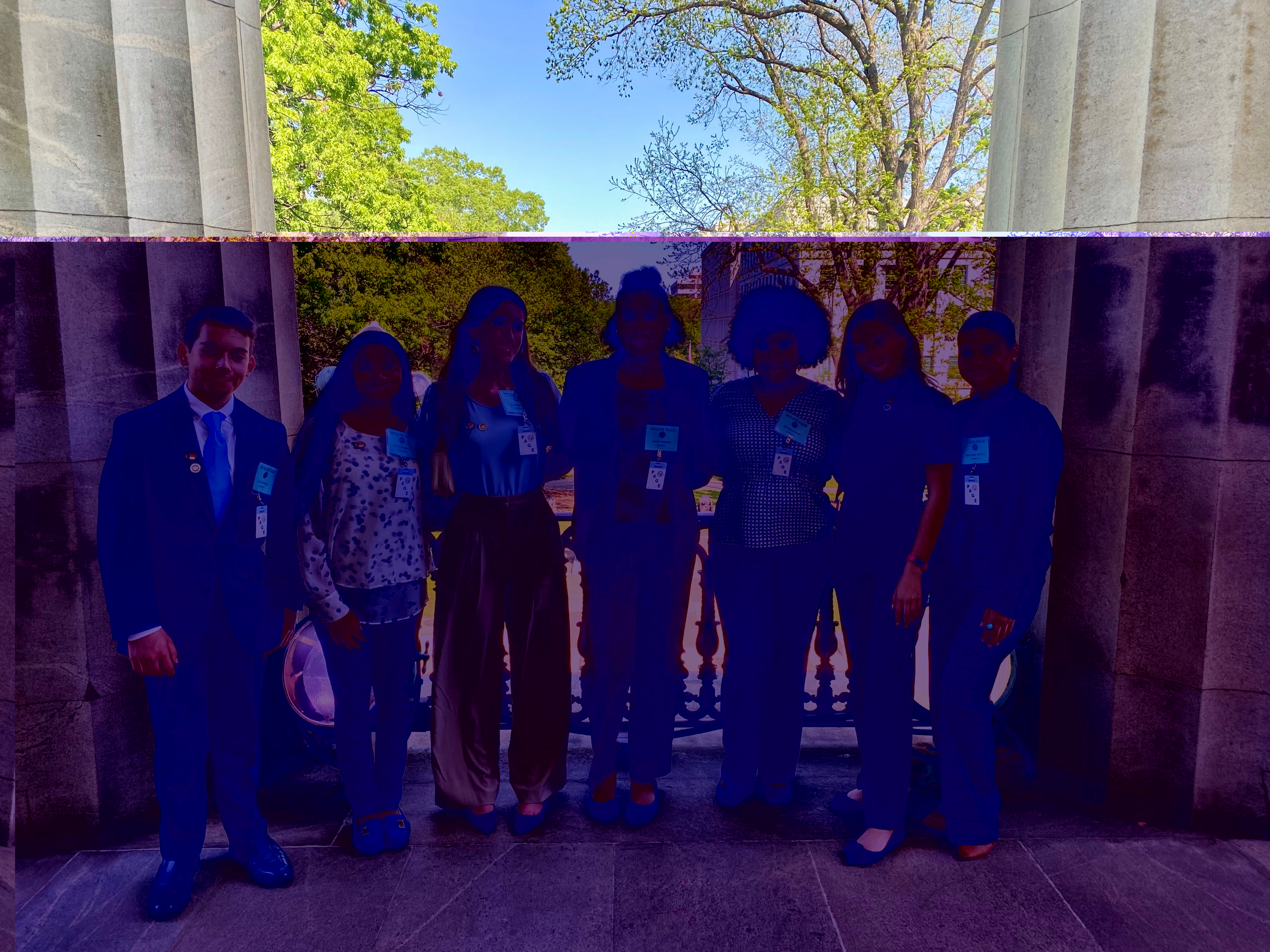 A group of Senate Pages outside the state capitol.